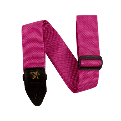 Pink guitar strap with a black buckle and gold Ernie Ball logo on a white background