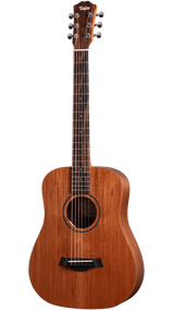 The image shows a Taylor dreadnought-style acoustic guitar with a natural reddish-brown wood finish. It features a 6-string steel setup, chrome tuning pegs, black bridge, traditional soundhole with a simple rosette, and a fretboard with dot markers. The classic dreadnought body highlights Taylor’s quality craftsmanship and balanced tone typical of their reliable, solid wood acoustic guitars.