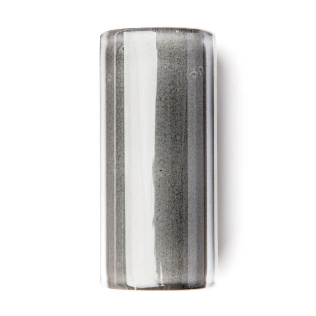 Clear cylindrical glass guitar slide on a white background
