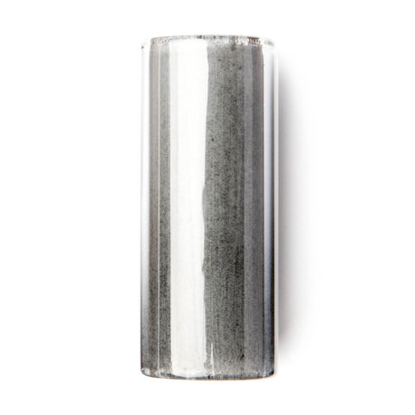 A cylindrical glass guitar slide on a white background.