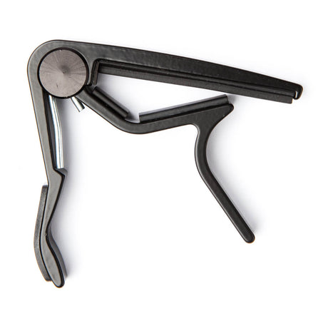 Metallic guitar capo on a white background