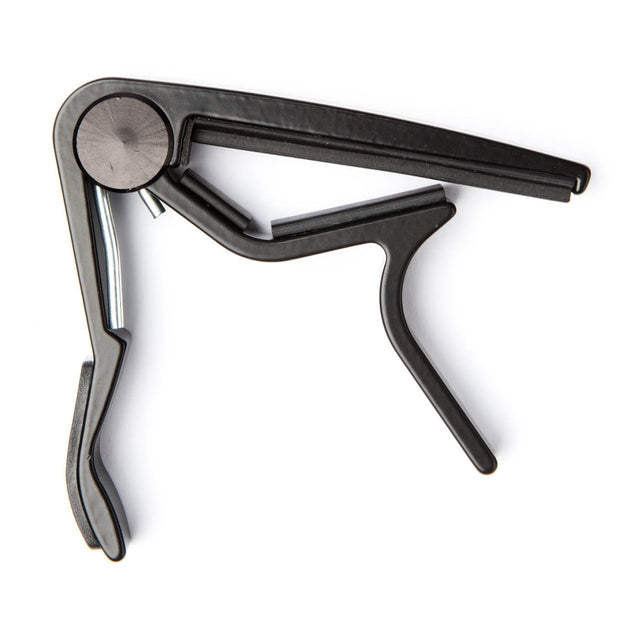 Metallic guitar capo on a white background