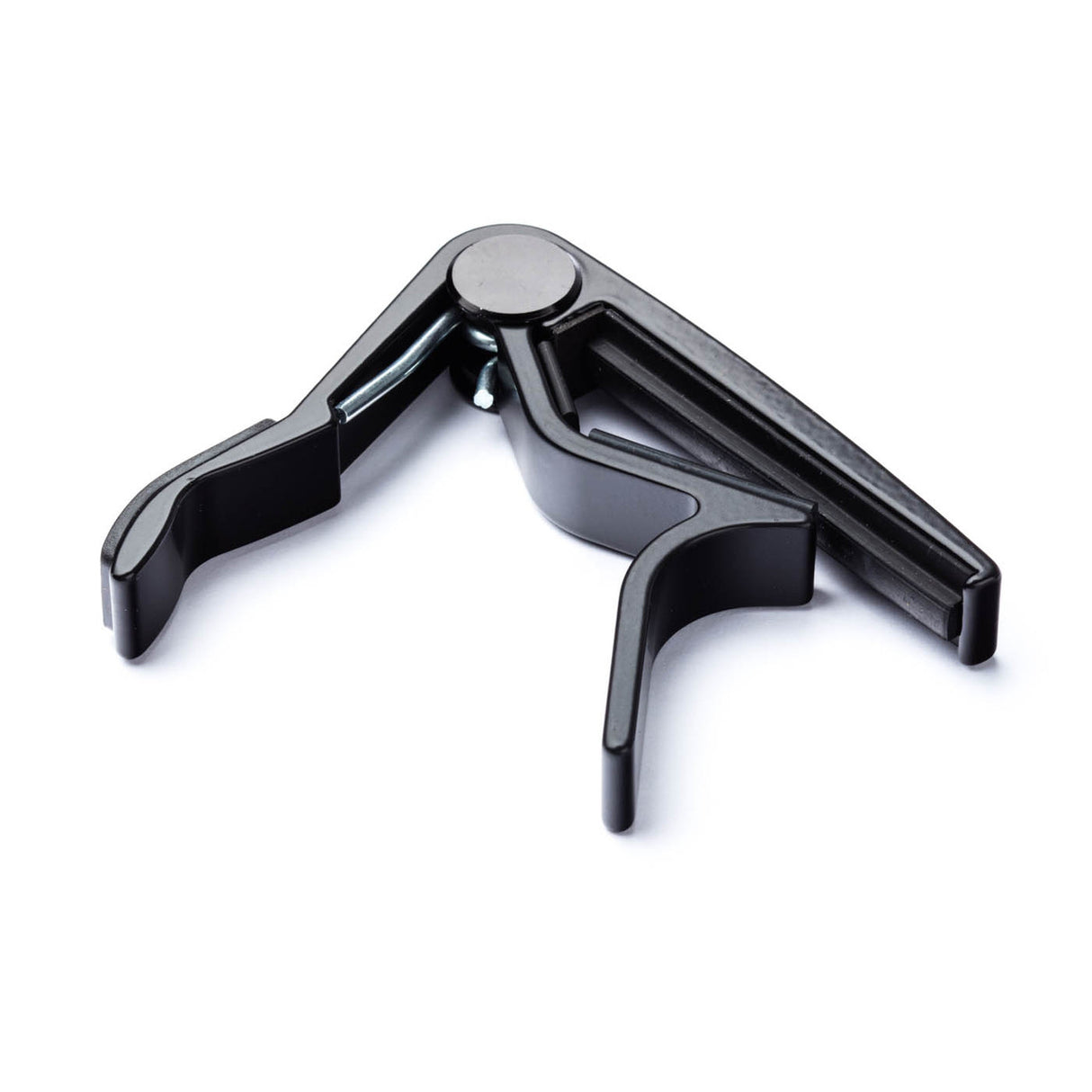 Black guitar capo on a white background