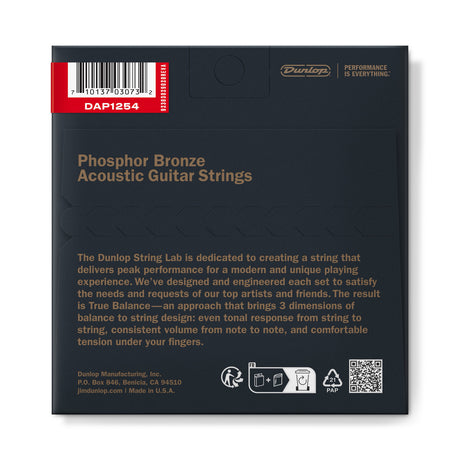 The image shows the back of a Dunlop Phosphor Bronze Acoustic Guitar Strings package (model DAP1254). It features the Dunlop brand with the tagline "Performance is Everything," a barcode, recycling symbols, and a QR code. The text highlights Dunlop’s "True Balance" design focusing on even tone, consistent volume, and comfortable tension. Made in the USA by Dunlop Manufacturing, Inc.