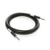 The image shows a professional-grade black instrument cable with thick jacketing and metal 1/4-inch TS or TRS connectors with black sleeves. It is coiled, suggesting a length of 10-20 feet, and has white band markings. This durable cable is used to connect guitars, keyboards, pedals, and other instruments to amplifiers or audio equipment in live or studio settings.