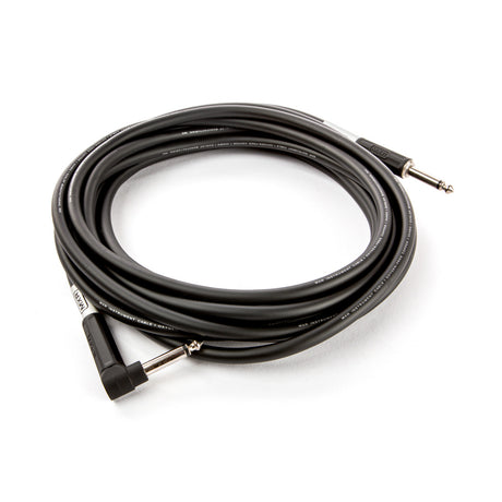 The image shows a black instrument cable with 1/4-inch TS connectors—one straight and one right-angle. Commonly used to connect electric guitars, basses, keyboards, and other electronic instruments to amplifiers or pedals, the right-angle end helps in tight spaces and reduces strain. This professional-quality cable is designed for studio or live use, featuring shielding to minimize noise and ensure reliable audio performance.