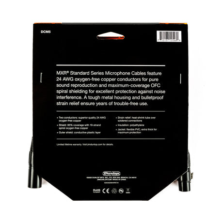 The image shows the back packaging of a Dunlop MXR Standard Series DCM5 professional microphone cable. Key features include 24 AWG oxygen-free copper conductors, 95% coverage OFC spiral shielding, noise protection, metal housing with strain relief, heat-shrink connections, polyethylene insulation, and a flexible PVC jacket. Branding, certifications, and "Made in China" are also visible.