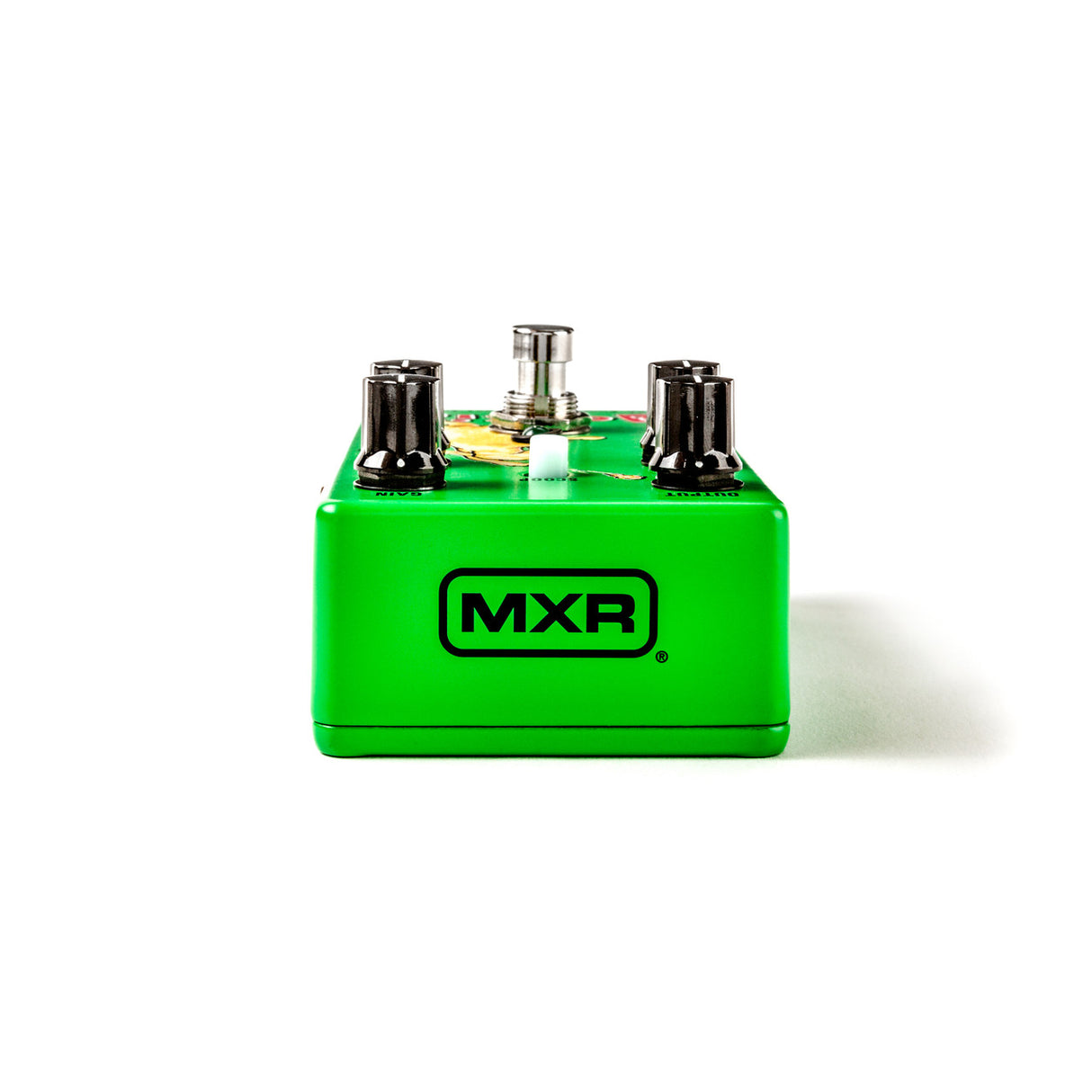 The image shows an MXR guitar effects pedal in bright green with the MXR logo on the front. It features two side jacks, control knobs on top, and a footswitch for activating the effect. MXR pedals are popular among musicians for adding effects like distortion and delay. Known for their compact, durable design, these pedals are built to withstand both live and studio use.