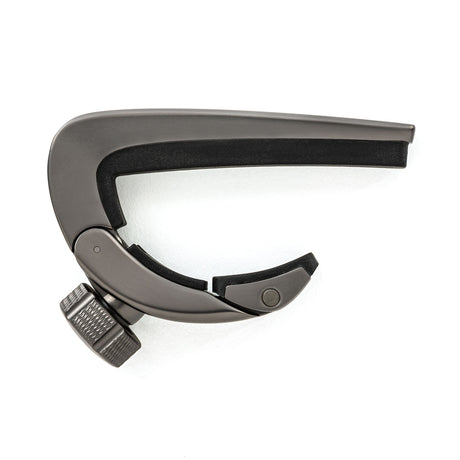 A metallic guitar capo on a white background.