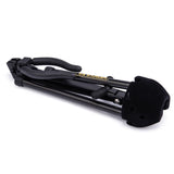 A black saxophone stand folded up on a white background