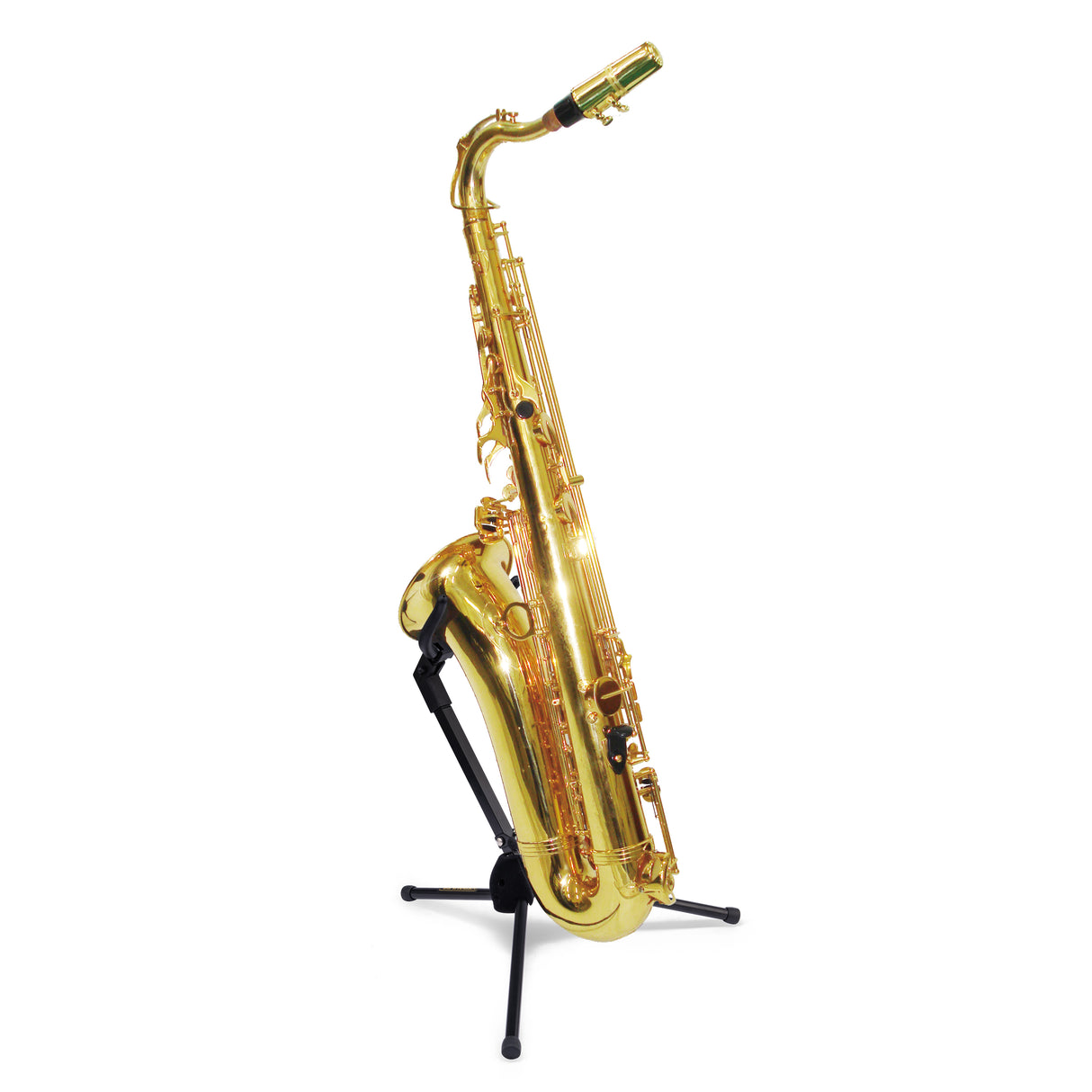 A gold tenor saxophone resting on a black stand against a white background