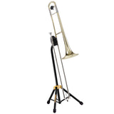 A gold trombone resting on a black trombone stand with Hercules branding on a white background