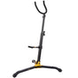 A black and yellow baritone saxophone stand on a white background