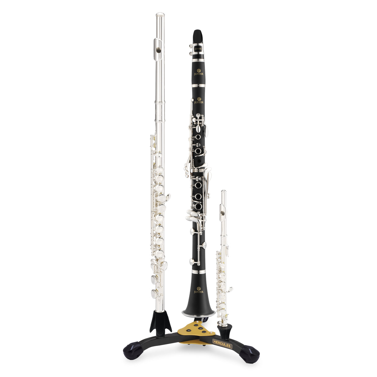 Three instruments - flute, clarinet, and piccolo resting on a black and yellow stand with Hercules branding