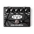 The image shows an EVH 5150 Overdrive guitar pedal with a black finish and iconic EVH striped graphics. It has five knobs: OUTPUT, BASS, MID, TREBLE, and GAIN, plus a GATE control for noise reduction, a BOOST switch, and a footswitch. Input and output jacks are at the top. This pedal delivers high-gain distortion, emulating Eddie Van Halen’s signature 5150 amp tone, popular with rock and metal guitarists.
