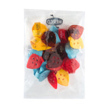 Packaged thumbpicks with colorful designs on a white background