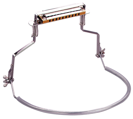 The image shows a harmonica holder—a metal frame worn around the neck with spring-loaded arms securing a wooden-finish diatonic harmonica. It features adjustable mechanisms for precise positioning, enabling hands-free playing while performing on other instruments like guitar. Popularized by Bob Dylan, this professional-grade accessory offers musicians versatility for both studio and live performances.