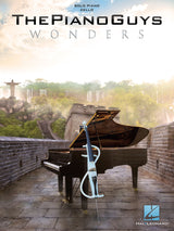 The image shows the cover of "The Piano Guys - Wonders" songbook published by Hal Leonard. It features a black grand piano with its lid open and a white electric cello, both set on the Great Wall of China with waterfalls in the background. The top indicates arrangements for solo piano and cello, reflecting The Piano Guys’ blend of classical and contemporary music. The Hal Leonard logo appears at the bottom right.