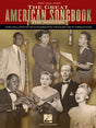 The image shows the cover of a music songbook titled "The Great American Songbook: The Singers," a piano/vocal/guitar collection by Hal Leonard. It features a vintage black-and-white photo of mid-20th-century male and female performers around classic microphones, with one holding a trumpet. The book includes sheet music and lyrics for 100 American standards from the golden age of popular music.