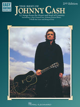 The image shows the cover of "The Best of Johnny Cash" (2nd Edition) guitar songbook published by Hal Leonard. Part of the "Easy Guitar with Notes & Tab" series, it features 27 beginner to intermediate songs, including hits like "A Boy Named Sue," "Folsom Prison Blues," and "Ring of Fire." The cover depicts Johnny Cash in his signature black outfit holding a black acoustic guitar against a moody sky with bare trees.