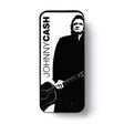 Johnny Cash pick tin on a white background