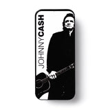 Johnny Cash pick tin on a white background