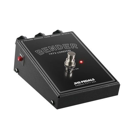 The image shows a black JHS Pedals "BENDER 1973 LONDON" guitar effects pedal with a matte finish and white lettering. It features three knobs labeled "VOLUME," "TONE," and "ATTACK," a central footswitch, a red LED indicator, and a left-side toggle switch labeled "MODE." Designed to emulate classic 1970s British rock fuzz or distortion tones, it has a vintage-inspired, compact stompbox design made in Kansas City, USA.
