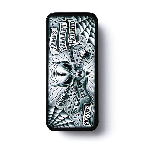 Pick tin with black and white skull and guitar artwork on the top. The tin is on a white background