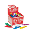 The image shows a retail display box of Hohner kazoos in bright colors like red, blue, yellow, green, purple, and white. The kazoos, made of unbreakable plastic, feature the tagline "A Fun Music Maker!" These beginner-friendly wind instruments create a buzzing sound when hummed and are popular for music education, casual play, and parties. Several kazoos are scattered around the box, highlighting their simple tube-like design.