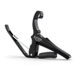 The image shows a KYSER spring-loaded quick-change guitar capo with a sleek black metal frame. It features a curved clamp, padded bar to press strings, a spring mechanism for one-handed use, and an ergonomic grip. Designed for steel-string acoustic or electric guitars, it raises string pitch by clamping across frets, enabling easy key changes while using familiar chords. KYSER is a trusted brand popular with guitarists.