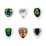 Set of six guitar picks with unique designs on a white background