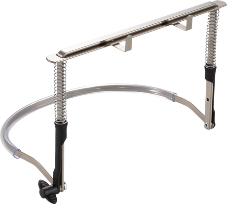 The image shows a professional-grade metal music stand with black accents. It features a flat ledge for sheet music, two spring-loaded arms to secure pages, a curved support arm, an adjustable telescoping height mechanism, and a tripod base for stability. Designed for musicians, it holds sheet music securely at optimal reading height, making it suitable for various performance settings.