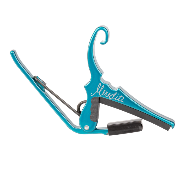 A teal Kyser guitar capo with 'Meredith' signature on a white background