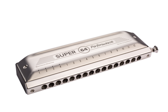 The image shows a chromatic harmonica, the "Super 64 Performance" model, with a sleek silver finish. It features "SUPER 64 Performance," "Made in Germany," and "Matthias Hohner" branding on the top cover, numbered holes 1-12, blow holes on the front, and a button-activated slide on the right. The professional metal comb and covers highlight its high-quality craftsmanship, designed for full chromatic range and advanced musical use.