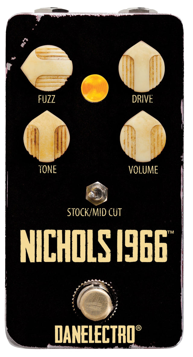 The image shows a Danelectro "Nichols 1966" guitar effects pedal. This compact black pedal has a vintage 1960s design and features four cream-colored knobs labeled Fuzz, Drive, Tone, and Volume. It includes a toggle switch for "Stock/Mid Cut" tonal options and a footswitch at the bottom. The worn finish adds to its retro look. The pedal recreates classic 60s fuzz and overdrive tones, ideal for vintage-style guitar sounds.
