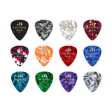 Set of Jim Dunlop guitar picks in various colors on a white background