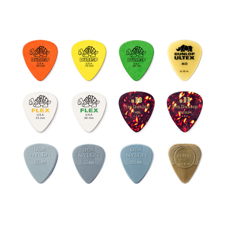 Set of colorful Dunlop guitar picks on a white background