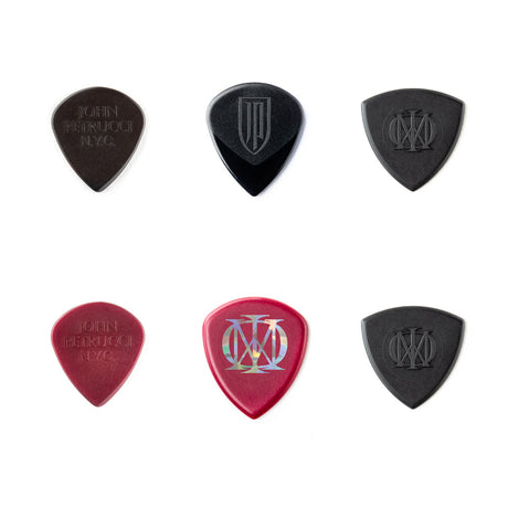 Six assorted guitar picks in a grid pattern on a white background
