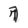 The image shows a black, spring-loaded clamp-style guitar capo with a curved mechanism, padded bar, and ergonomic handle for one-handed use. Made from metal and rubber or silicone, it features a sleek, modern design. This accessory clamps across the fretboard to raise string pitch, allowing guitarists to change keys easily while maintaining chord shapes. It appears to be a high-quality, professional-grade model.