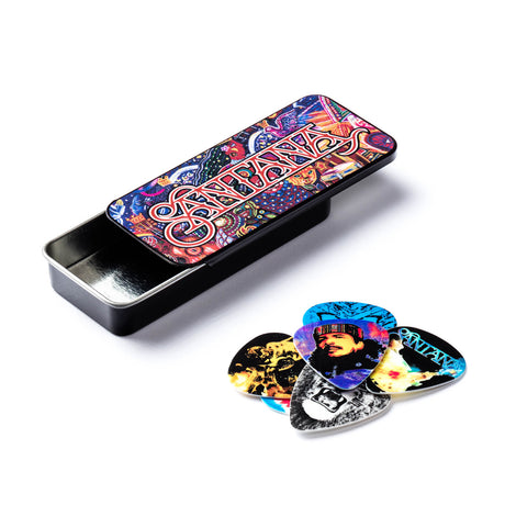 Santana guitar pick tin with assorted picks on a white background