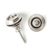 A pair of guitar straplocks with a vintage nickel finish on a white background