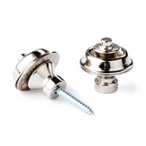 A pair of guitar straplocks with a nickel finish on a white background