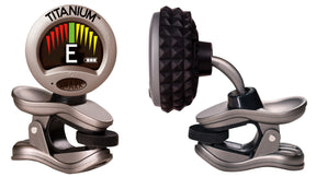 The image shows a Snark Titanium clip-on electronic tuner with a digital LCD displaying the note "E" and a colorful LED indicator bar signaling pitch accuracy. It features a titanium finish, strong spring-loaded clip, flexible gooseneck arm, and compact design. Used for chromatic tuning of stringed instruments, it’s a popular, portable tool for quick and precise tuning.