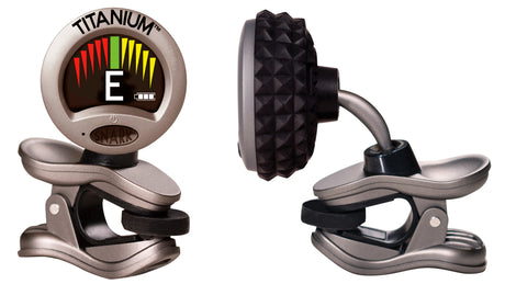 The image shows a Snark Titanium clip-on electronic tuner with a digital LCD displaying the note "E" and a colorful LED indicator bar signaling pitch accuracy. It features a titanium finish, strong spring-loaded clip, flexible gooseneck arm, and compact design. Used for chromatic tuning of stringed instruments, it’s a popular, portable tool for quick and precise tuning.