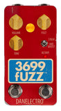 The image shows a Danelectro "3699 Fuzz" guitar effects pedal with a bright red casing and retro blue label. It features Volume, Fuzz, and Tone knobs, a toggle switch for Stock/Mid Boost/Octave modes, two footswitches, and input/output jacks. Designed for vintage-style distorted fuzz tones, this pedal adds classic 1960s rock sound and octave-up effects for extra tonal variety.