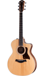 The image shows a Taylor cutaway acoustic guitar with a natural light wood top and darker back and sides. It features a tortoiseshell pickguard, chrome tuning machines, an ebony fretboard with inlays, and a decorative sound hole rosette. The cutaway design allows easy access to higher frets. This high-quality guitar likely belongs to Taylor’s 200, 300, or 400 series, known for balanced tone and excellent craftsmanship.