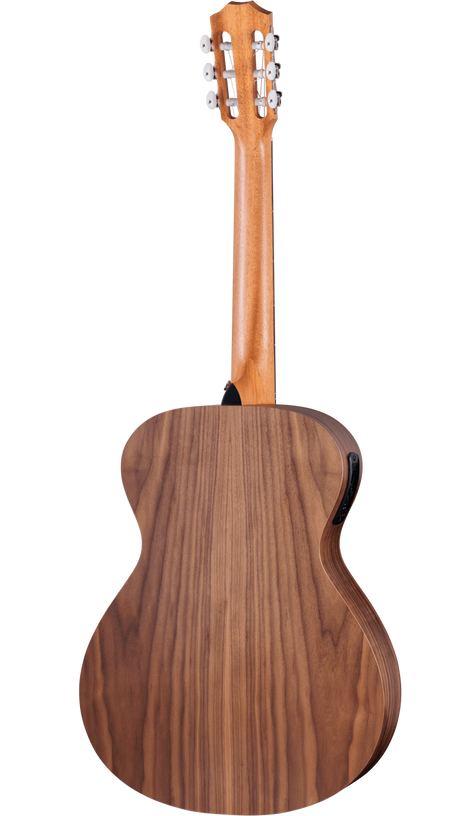 The image shows the back of a full-size acoustic-electric guitar with a walnut or similar wood body featuring distinctive grain and a lighter wood neck. It has six chrome tuning pegs on a traditional headstock and built-in electronics, including a battery compartment or control panel, for amplified play. The guitar has a polished, natural finish and a classic curved waist design, suitable for both beginners and experienced players.