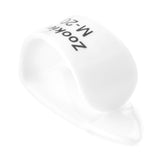 A white thumbpick with Zookies branding on a white background