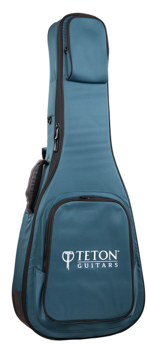 The image shows a teal and black padded gig bag from Teton Guitars, designed to carry and protect a full-size acoustic guitar. It features the "TETON GUITARS" logo on the front pocket, multiple zippered compartments, padded shoulder straps, and durable fabric construction, providing ample storage for accessories like picks, strings, and tuners.