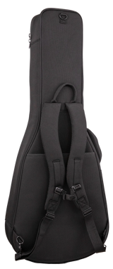 The image shows a black guitar gig bag with a durable fabric exterior. It features padded dual shoulder straps for backpack carry, a top handle, multiple zipped compartments, metal D-rings, and adjustable straps with buckles to secure the guitar. This lightweight soft case protects the instrument from dust, light impacts, and weather, making it ideal for musicians who travel frequently.